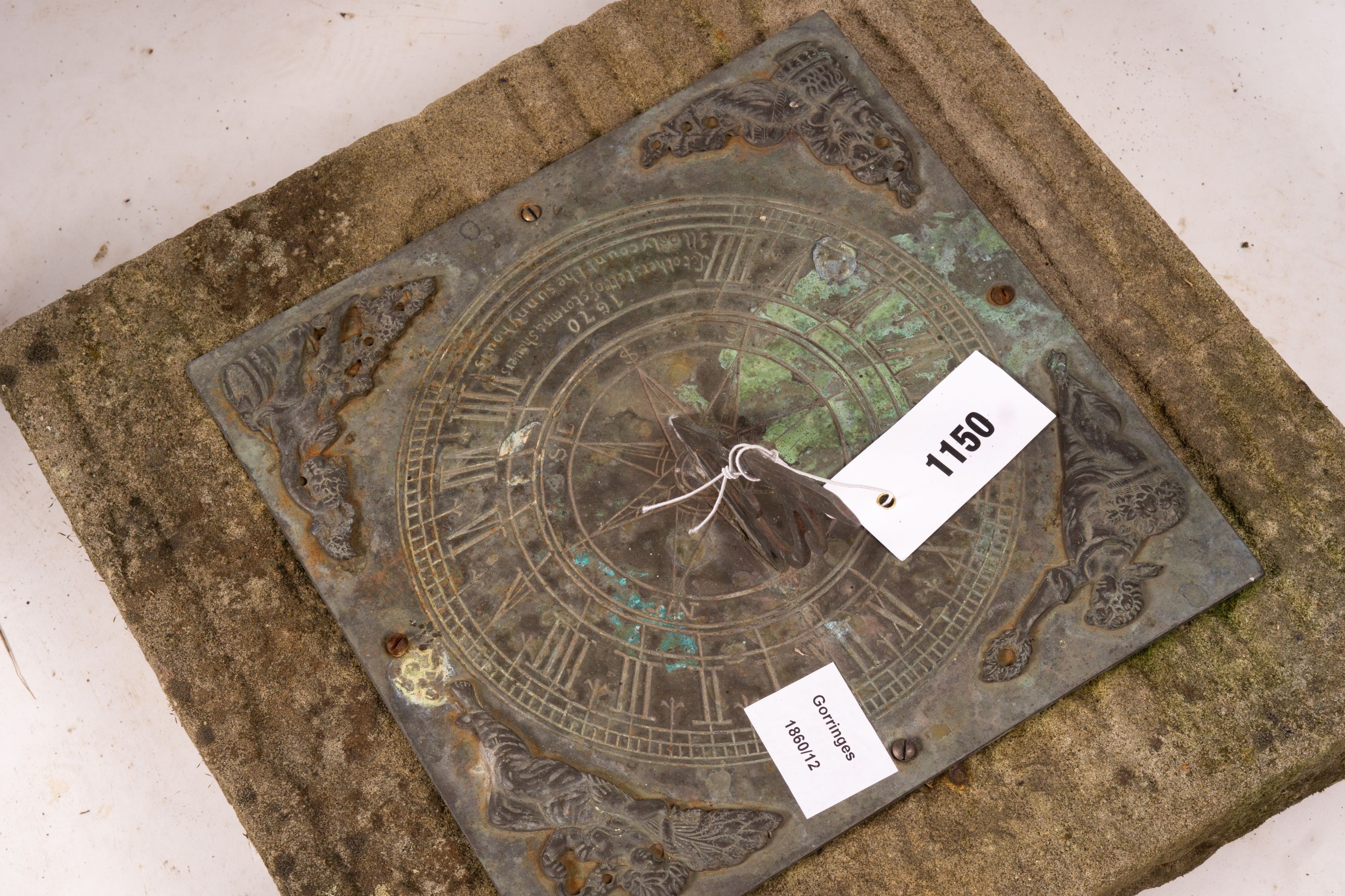 A 17th century style sun dial on Portland stone plinth, height 70cm